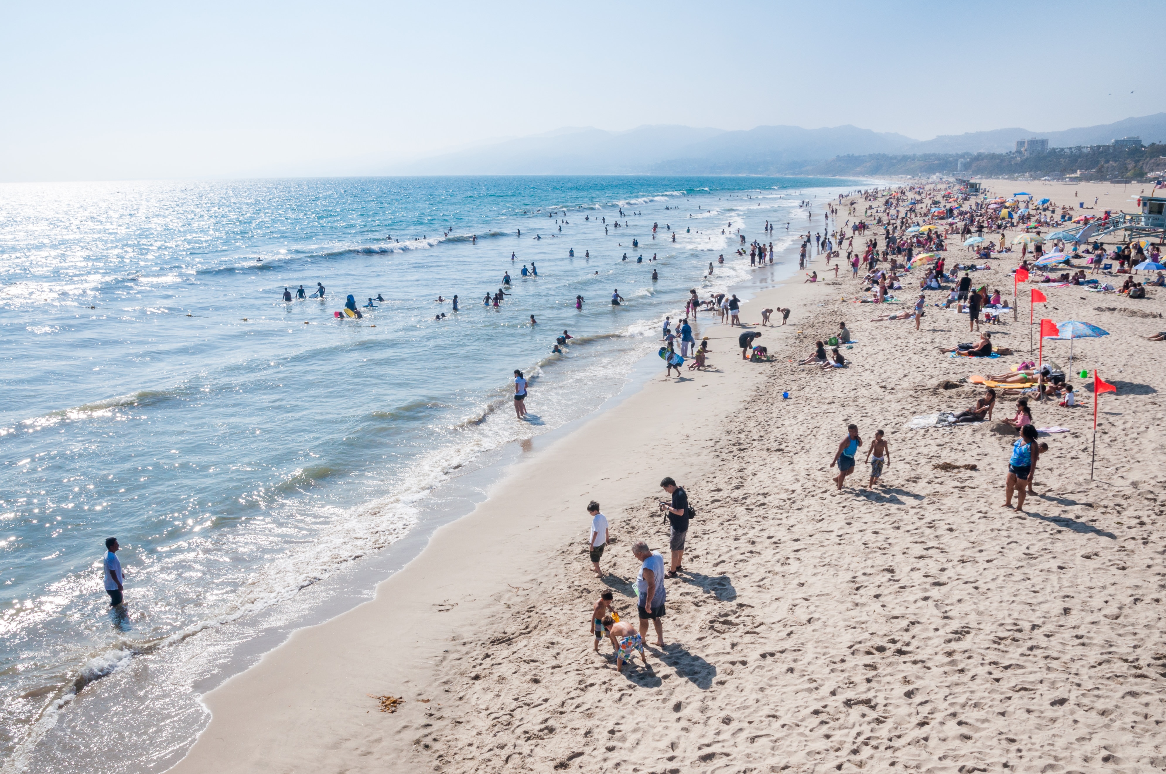 People Standing on Seashore -Author: J. Schiemann 